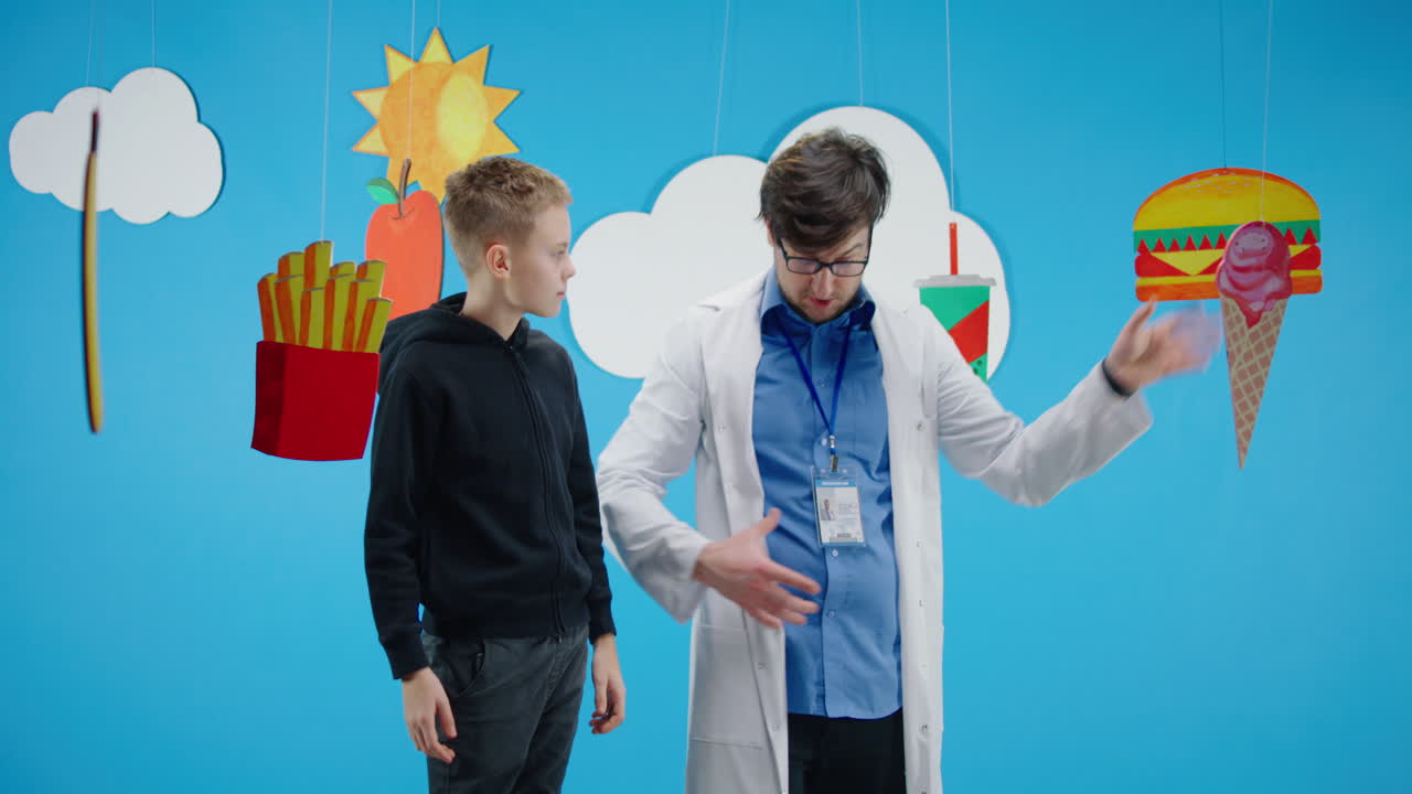 Doctor Discusses Healthy Eating with a Child