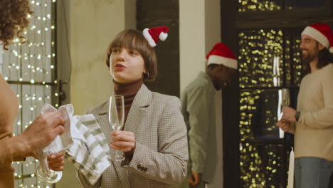 two women cleaning glasses