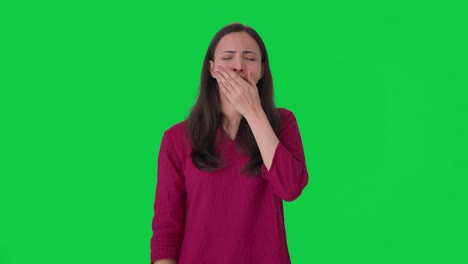 Tired-and-lazy-Indian-woman-yawning-and-relaxing-Green-screen