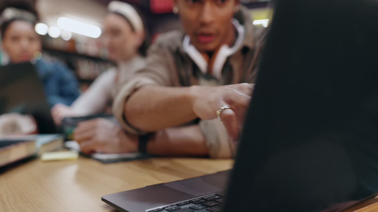 Students collaborating in a library