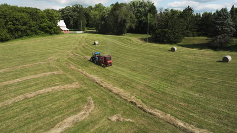 Baler-Machinery-Operating-On-Fields-After-Harvest-Season