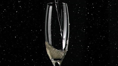 Animation-of-confetti-falling-over-champagne-glass