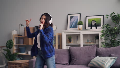 woman dancing in her living room