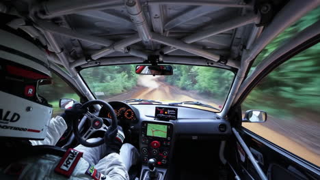 rally car interior view on a dirt road