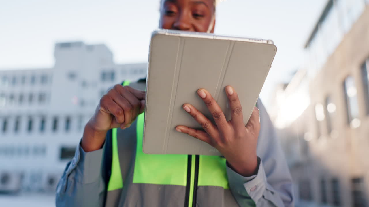 Woman Using Tablet in Urban Setting