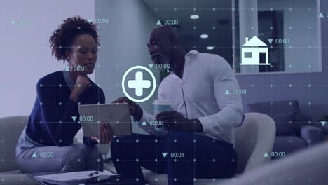 animation of financial data processing over diverse colleagues discussing work in office