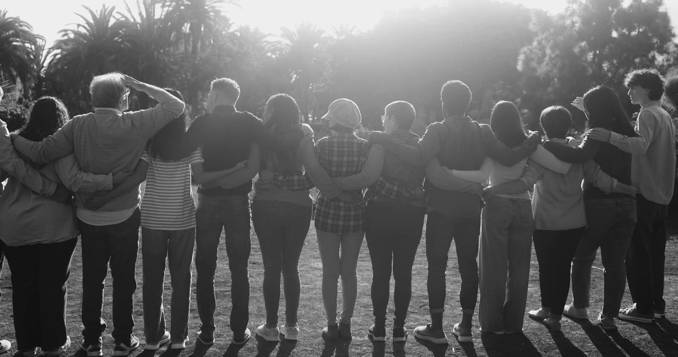 Diverse Group of People Standing United Outdoors in Black and White