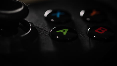 modern gamepad on a dark. game controller close-up.