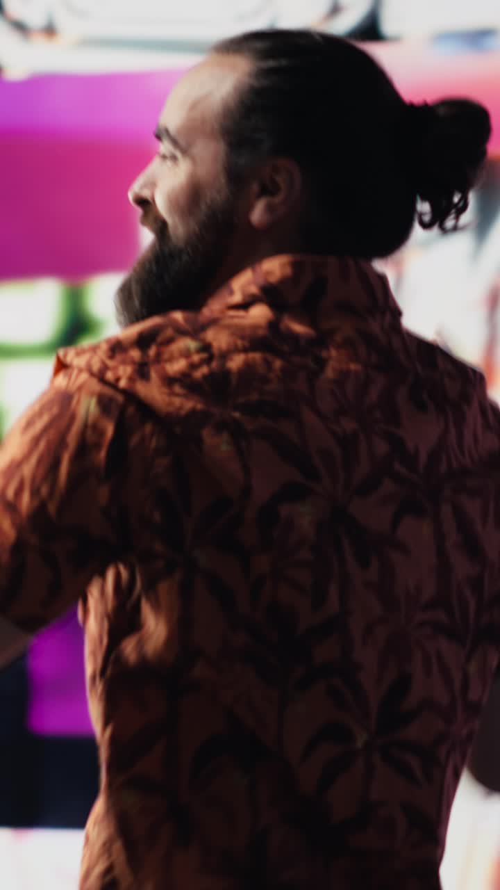 Vertical Video Cool digital content creator dancing under glowing neon lights