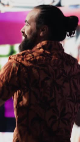 vertical video cool digital content creator dancing under glowing neon lights