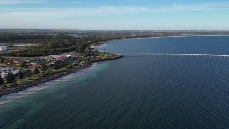 orbit shot of residential area in front of ocean, esperance town, western australia