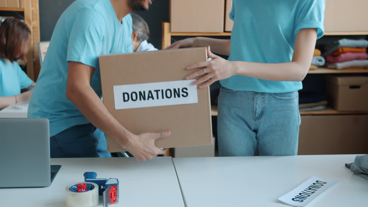 Volunteers Sorting and Packing Donations