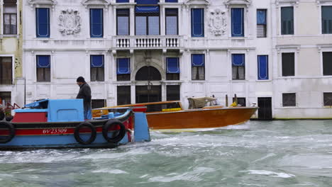 venetian canal scene with boats and palace