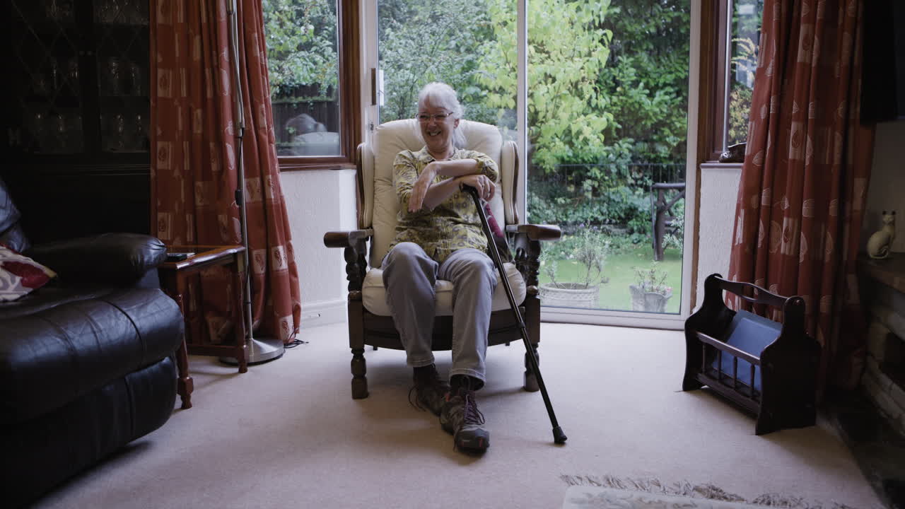 Senior woman relaxing in her living room