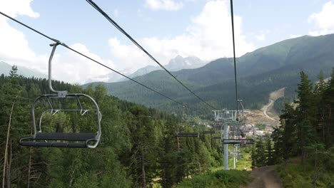 mountain ski lift with people