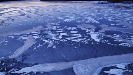 drone video reveals the grandeur of massive ice formations in the water