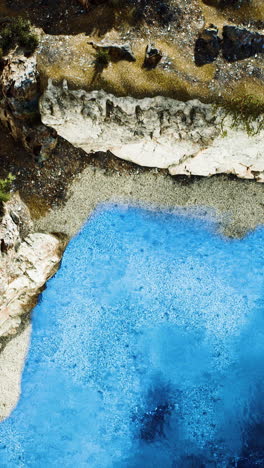 aerial view of a beautiful beach with crystal clear water