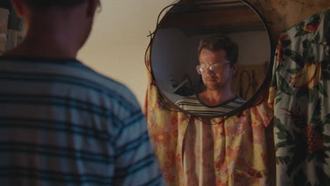 man looking in a mirror