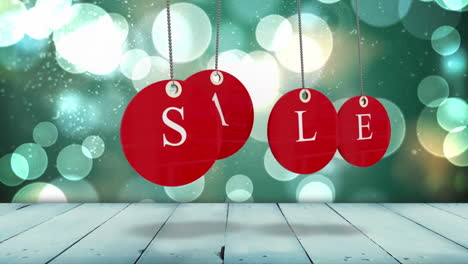 Red-sale-tags-hanging-against-glowing-background