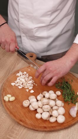 chef chopping mushrooms