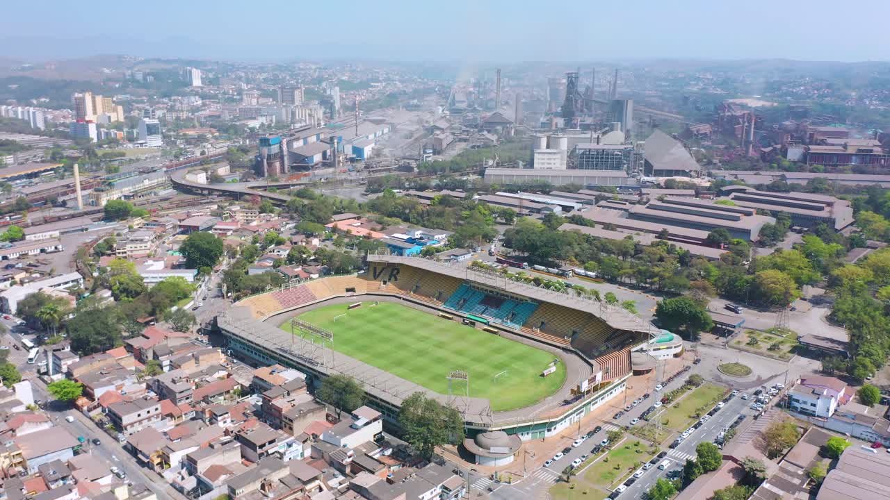 Aerial View of a Stadium in an Industrial City