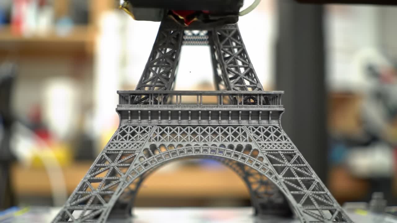 3D Printing Process of an Eiffel Tower Model: Capturing the Intricacies and Details of Each Layer Being Formed in Stunning Clarity