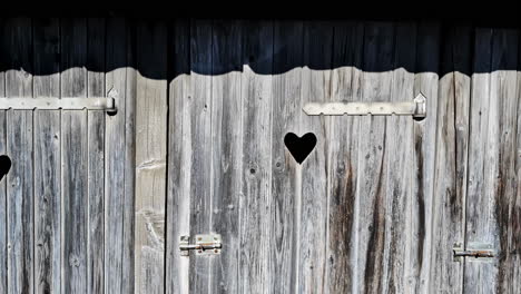 wooden door with heart-shaped hole