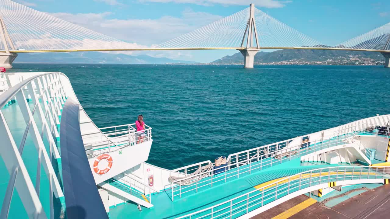 Rio-Antirrio toll bridge view from ferry boat crossing Gulf of Corinth