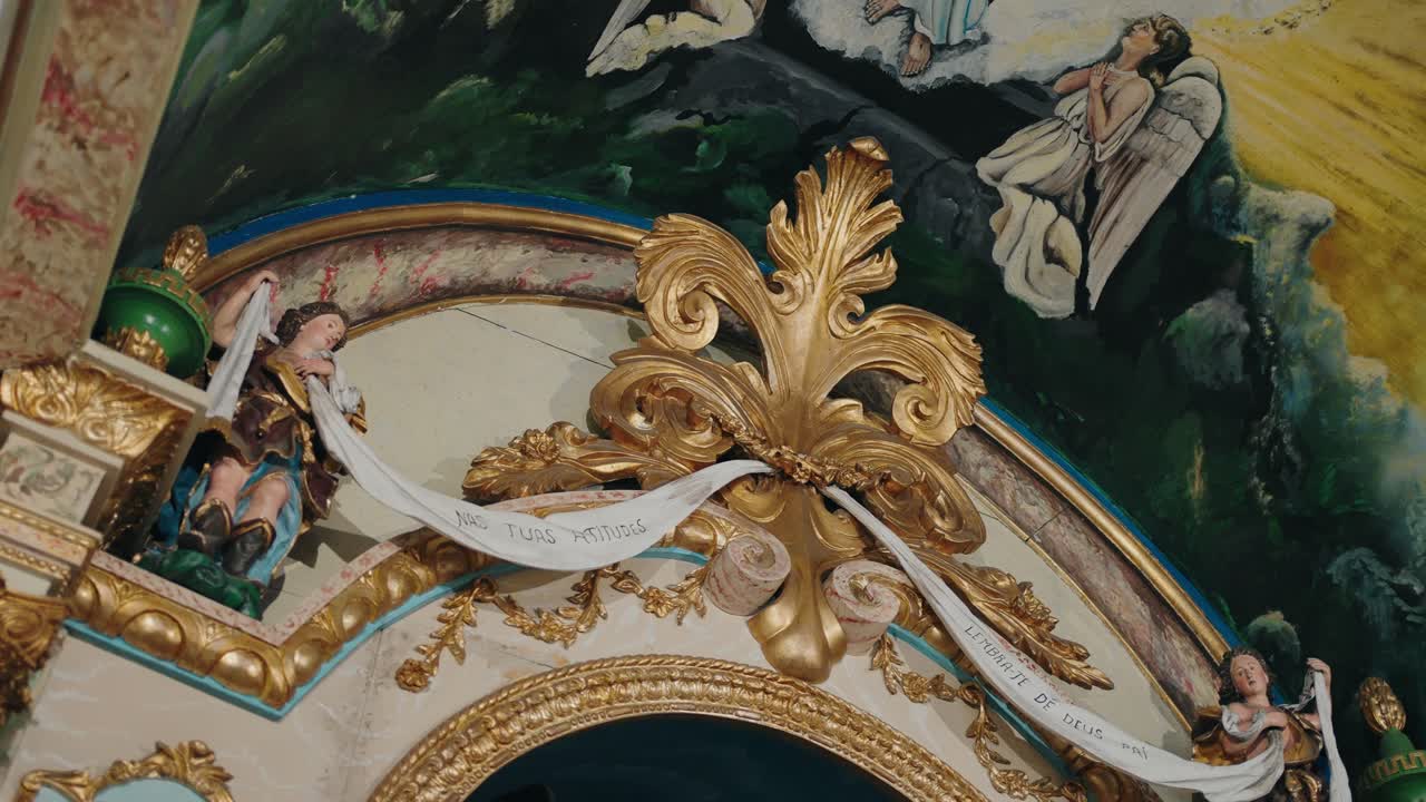 Majestic church ceiling adorned with angels and gold accents