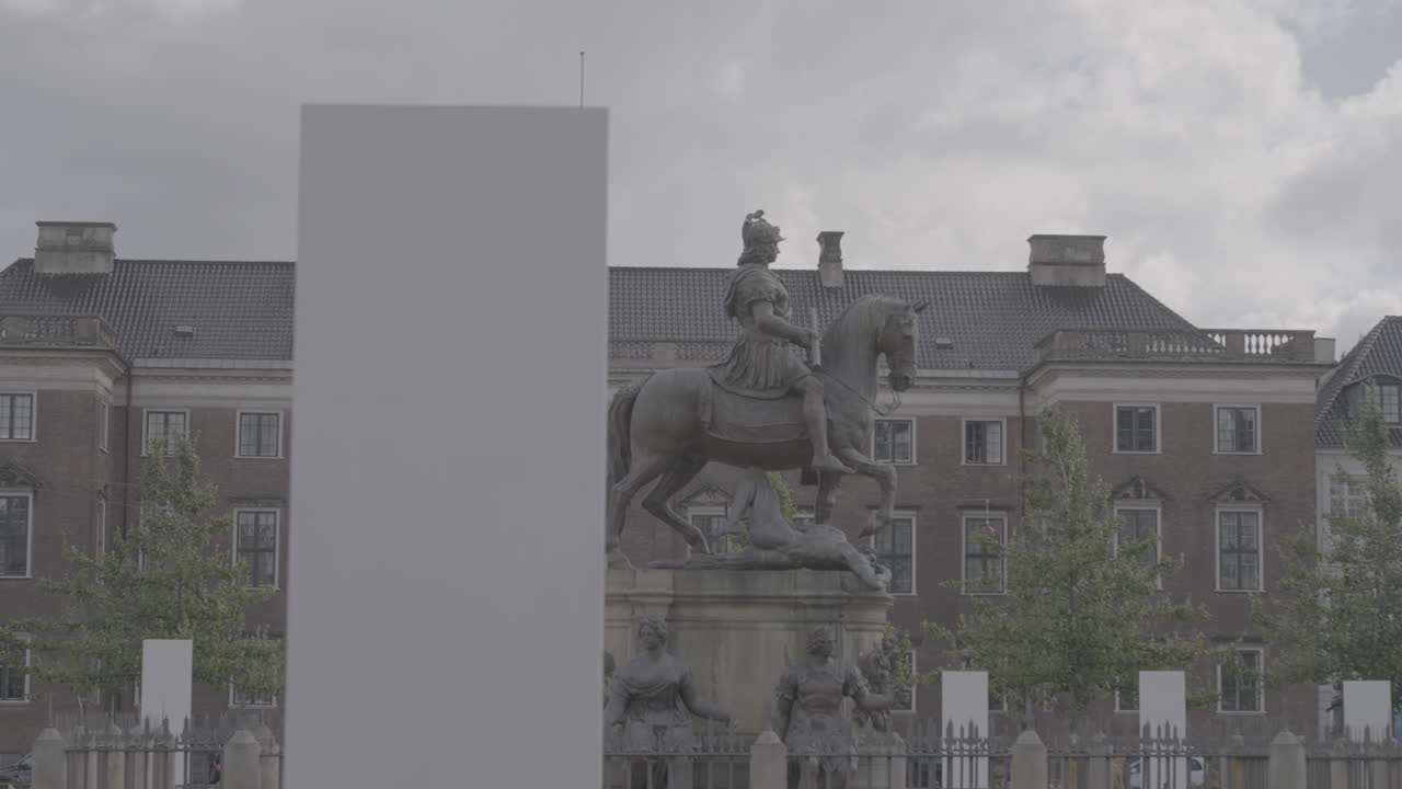 Horse statue on the New King's Square in Copenhagen Denmark on a cloudy day LOG