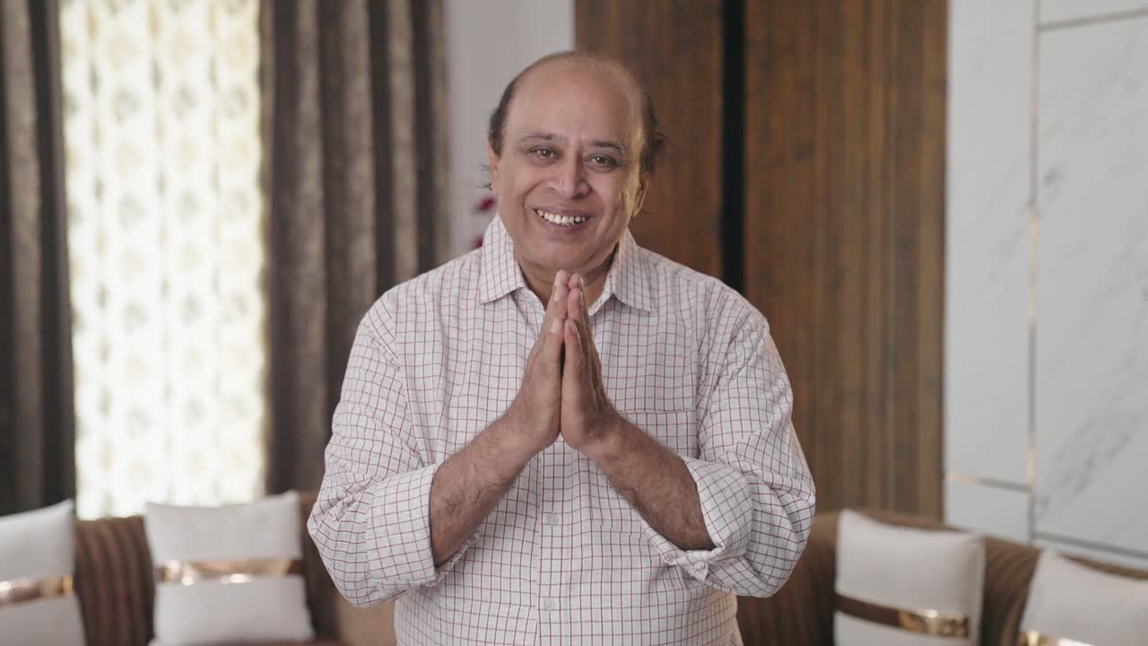 Desi Indian old uncle doing Namaste and greetings