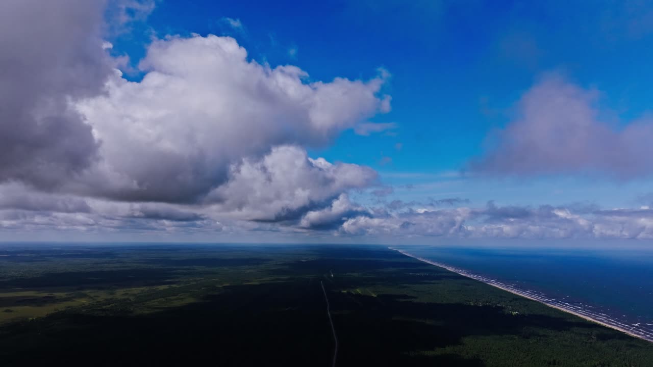 Drone captures towering clouds above Latvia’s Kolka coastline horizon