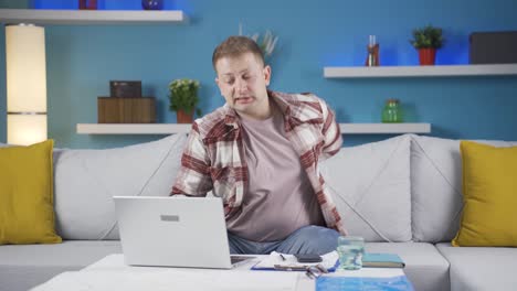 Home office worker man itching with allergies.