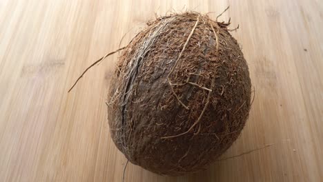 coconut close up on wooden background isolated 4k