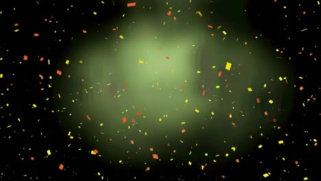 Animation-of-colorful-confetti-over-green-background