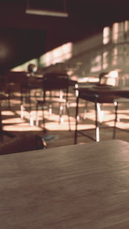 empty classroom with wooden desks and chairs