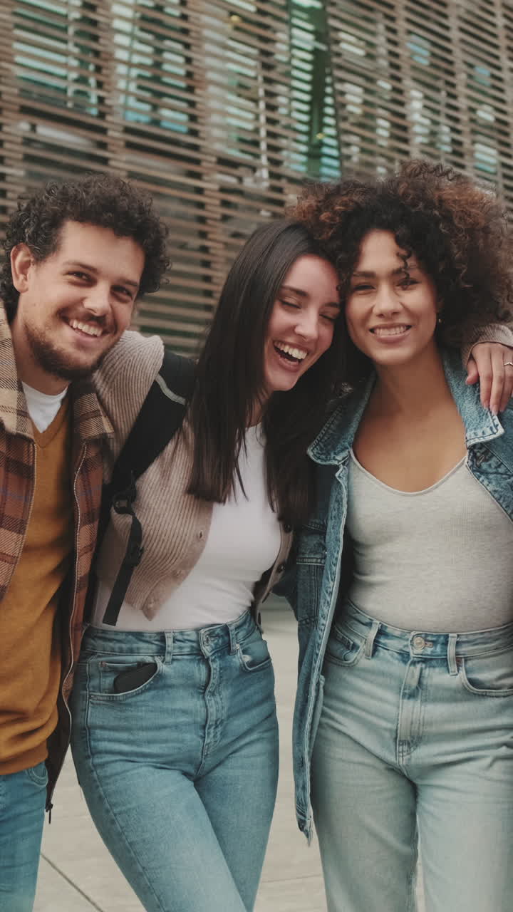 Group of Friends Embracing Outdoors
