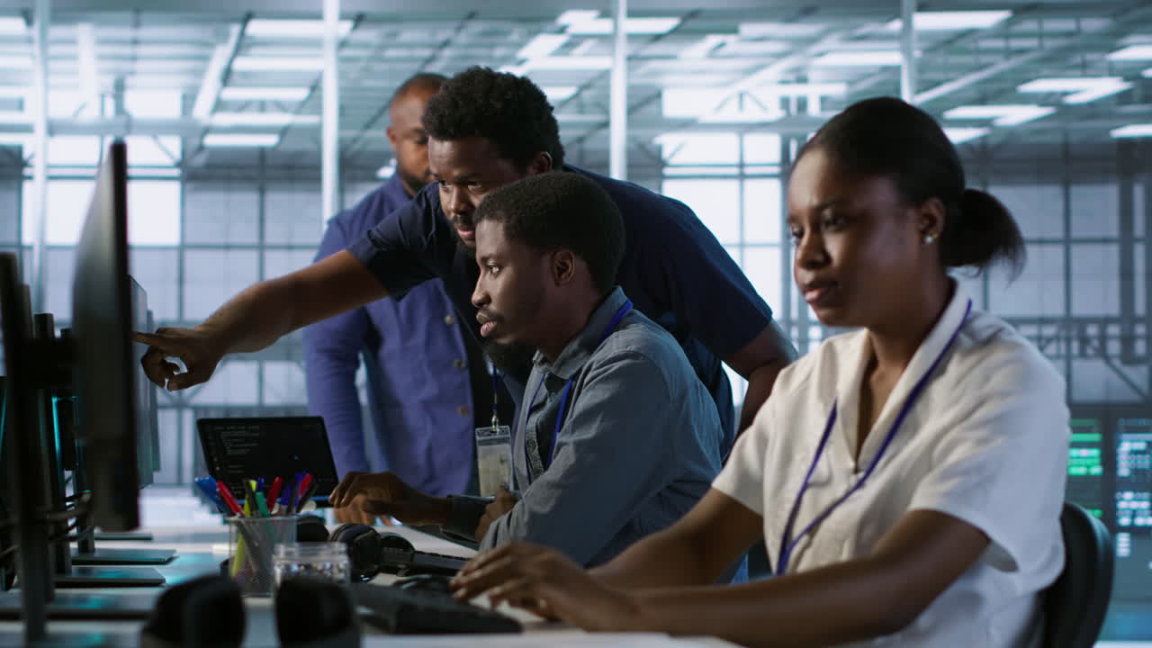 Diverse Team Collaborating on Computers