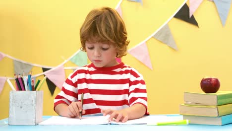 Happy-boy-using-a-paint-brush