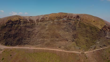 4K-aerial-pedestal-and-tilt-shot-of-the-crater-of-Mount-Vesuvius