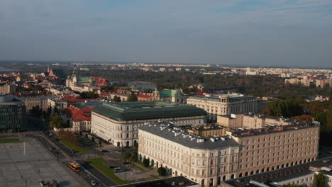 Aerial-view-of-palaces-in-old-town.-Large-splendid-buildings-in-historic-centre-of-city-in-late-afternoon-sunlight.-Warsaw,-Poland