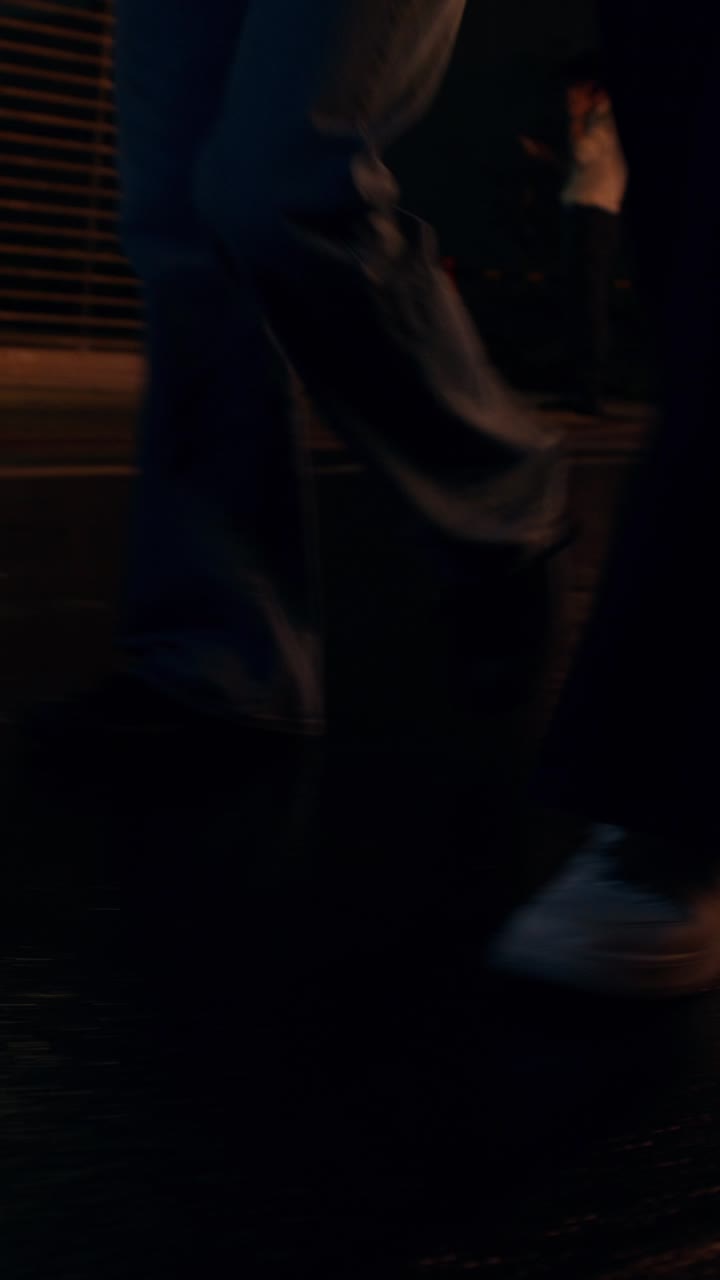 People walking at night in the city