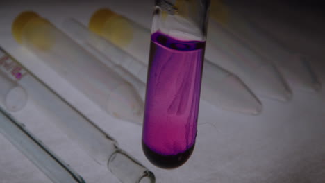 a test tube of purple liquid