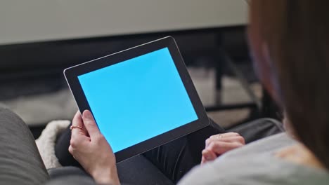 girl using digital tablet pc with blue screen