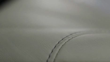 close-up of white perforated shoe material