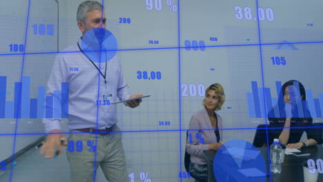 animation of data processing and diagrams over diverse colleagues talking in office