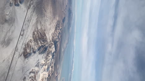 Snow-Covered-Mountains-on-a-Cold-Winters-Day-|-Vertical-Video-|-Aerial-View