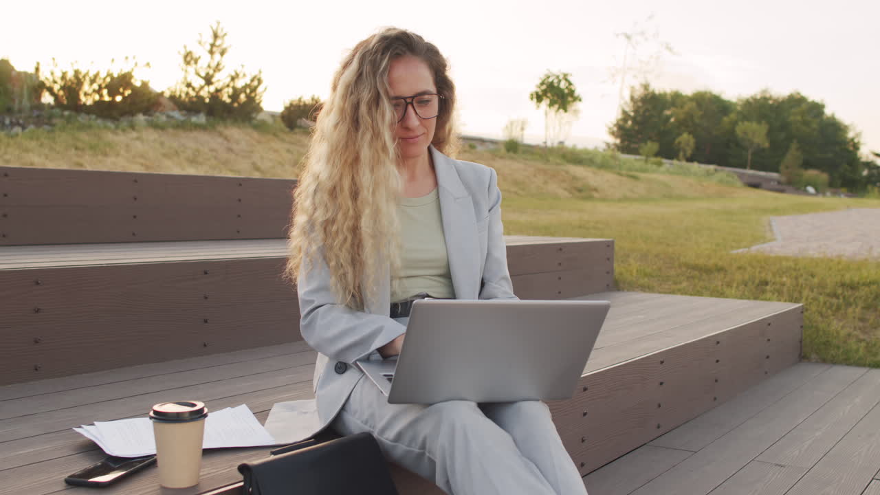 Blonde Business Lady Working Outdoors