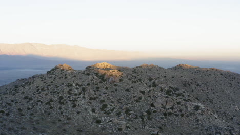 Stone-Mountain,-Culp-Valley-Primitive-Campground,-Anza-Borrego-Desert-State-Park,-Aerial-Tilt-Down