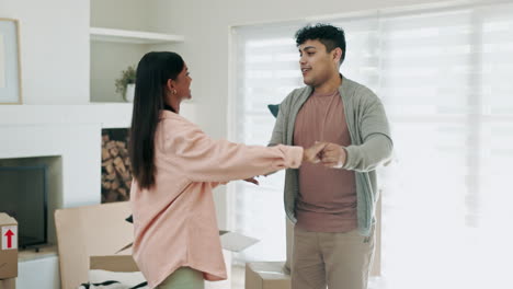 excited couple, dancing and celebrate new home